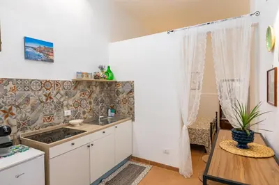 Cucina o angolo cottura di Casa Ariadne by Ortigia Apartments