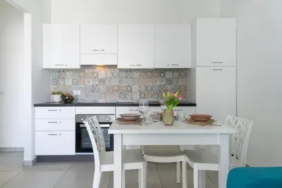 Cucina o angolo cottura di GuestHost - Borgo 84 Marzamemi - Casa Pachino