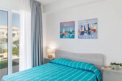 Letto o letti in una camera di GuestHost - Borgo 84 Marzamemi - Casa Pachino