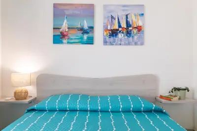 Letto o letti in una camera di GuestHost - Borgo 84 Marzamemi - Casa Pachino