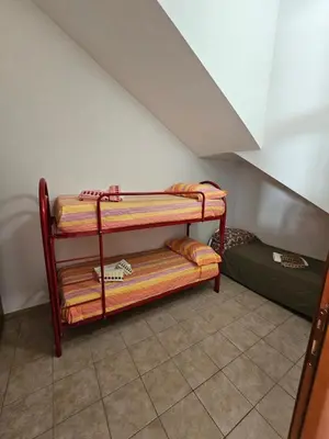 Letto o letti in una camera di Appartamento da Christian
