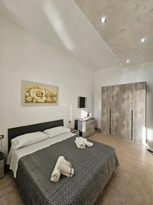 Letto o letti in una camera di Appartamento da Christian
