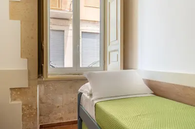 Letto o letti in una camera di A Casa di Fra by Wonderful Italy