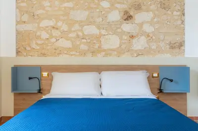Letto o letti in una camera di A Casa di Fra by Wonderful Italy