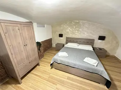 Letto o letti in una camera di Plebiscito house 63