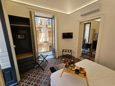 TV o dispositivi per l'intrattenimento presso Grey House Apartments