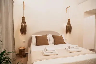Letto o letti in una camera di OAZA Design Apartments Jacuzzi Suite or Shower City Center Catania
