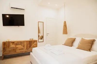Letto o letti in una camera di OAZA Design Apartments Jacuzzi Suite or Shower City Center Catania