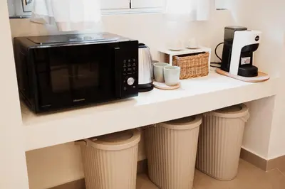 Cucina o angolo cottura di OAZA Design Apartments Jacuzzi Suite or Shower City Center Catania