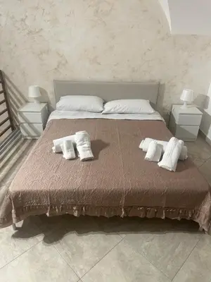 Letto o letti in una camera di NICOTRA'S home