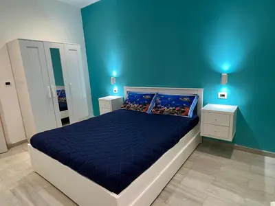 Letto o letti in una camera di Profumo di mare