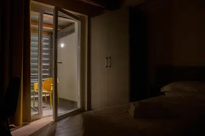 Letto o letti in una camera di KRINO' hotel cafè