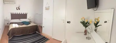 Letto o letti in una camera di Casa della Loggia