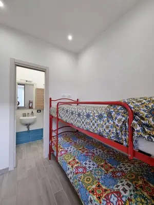 Letto o letti in una camera di Maria Blue House
