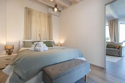 Letto o letti in una camera di Villa Elysian con piscina privata