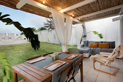 Area soggiorno di Villa Elysian con piscina privata