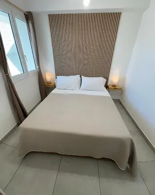 Letto o letti in una camera di Le Voyage Holiday Home Marzamemi