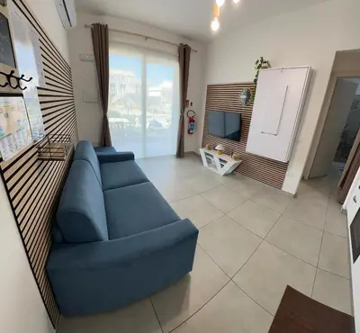 TV o dispositivi per l'intrattenimento presso Le Voyage Holiday Home Marzamemi