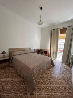 Letto o letti in una camera di La Casa di Modica