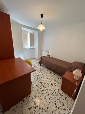 Letto o letti in una camera di La Casa di Modica