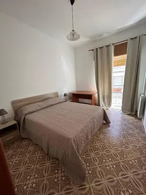 Letto o letti in una camera di La Casa di Modica