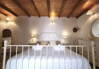 Letto o letti in una camera di Il Cortile di Dioniso