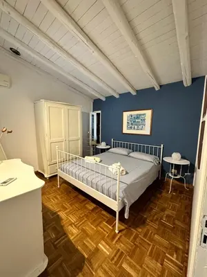 Letto o letti in una camera di Dionigi suite