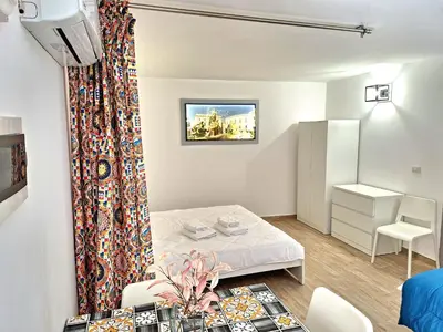 Letto o letti in una camera di Nata Sicula