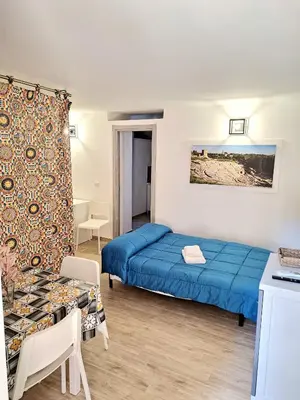 Letto o letti in una camera di Nata Sicula
