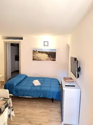 Letto o letti in una camera di Nata Sicula