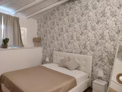 Letto o letti in una camera di New Superior Holiday House