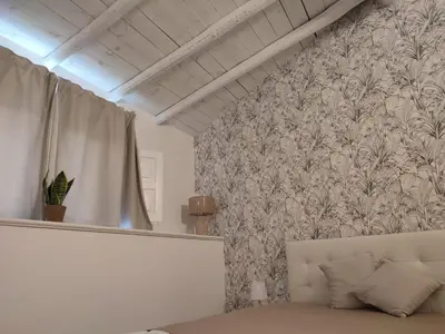 Letto o letti in una camera di New Superior Holiday House
