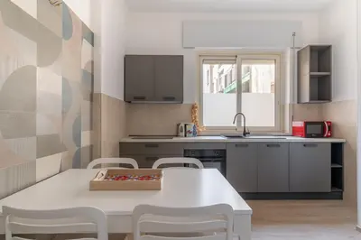 Cucina o angolo cottura di Santamaria Apartment by Wonderful Italy