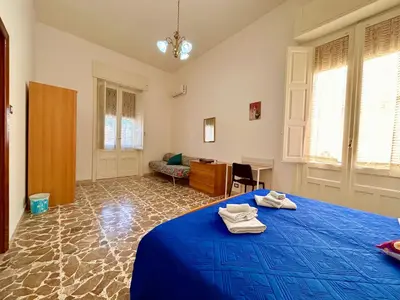 Letto o letti in una camera di Macramè