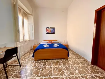 Letto o letti in una camera di Macramè