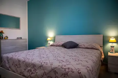 Letto o letti in una camera di A Casa di Nella