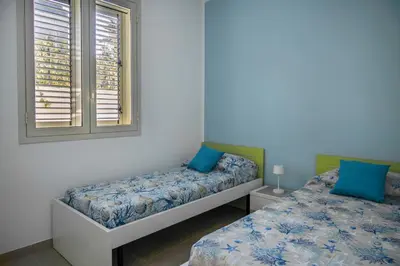Letto o letti in una camera di A Casa di Nella