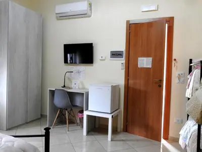 TV o dispositivi per l'intrattenimento presso Il cappello sulle 23! Camere in affitto breve
