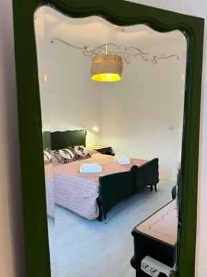 Letto o letti in una camera di Avi Rooms
