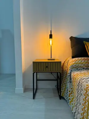 Letto o letti in una camera di Avi Rooms