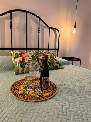 Letto o letti in una camera di Avi Rooms