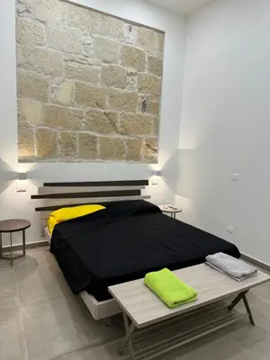 Letto o letti in una camera di Stella Dionigiana