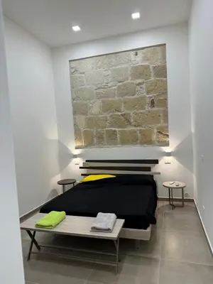 Letto o letti in una camera di Stella Dionigiana