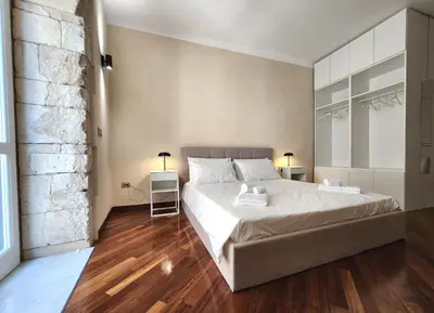 Letto o letti in una camera di Candemira - Ortigia Marina Apartment