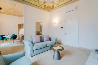 Area soggiorno di Palazzo Pupillo fine apartments by Dimore in Sicily
