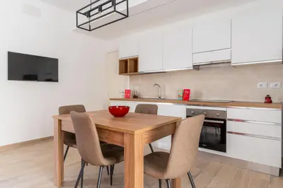 Cucina o angolo cottura di Russu Suli Apartments by Wonderful Italy