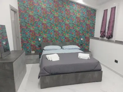 Letto o letti in una camera di Sweet home