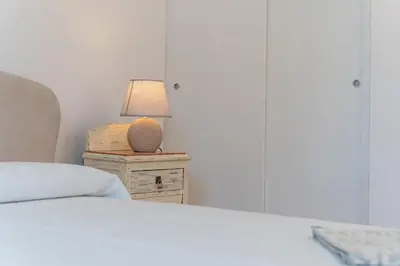 Letto o letti in una camera di Villa Le Tre Muse Beach
