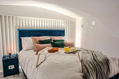 Letto o letti in una camera di FicuriniasHouse-Cozy Central Flat with Parking