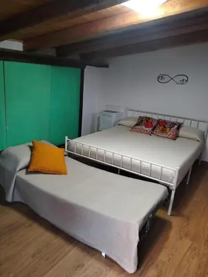 Letto o letti in una camera di MuSa Apartment